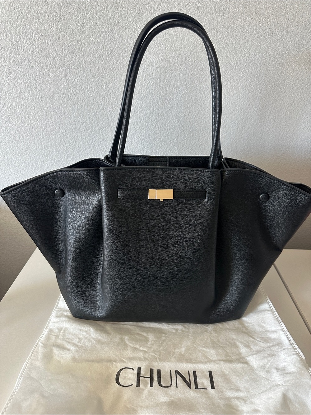 Black Structured Faux Leather Tote Bag with Gold Accent Buckle